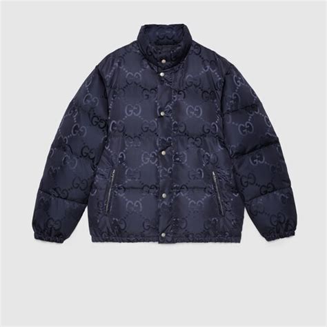 Veste garnie de duvet en toile GG jumbo en bleu .